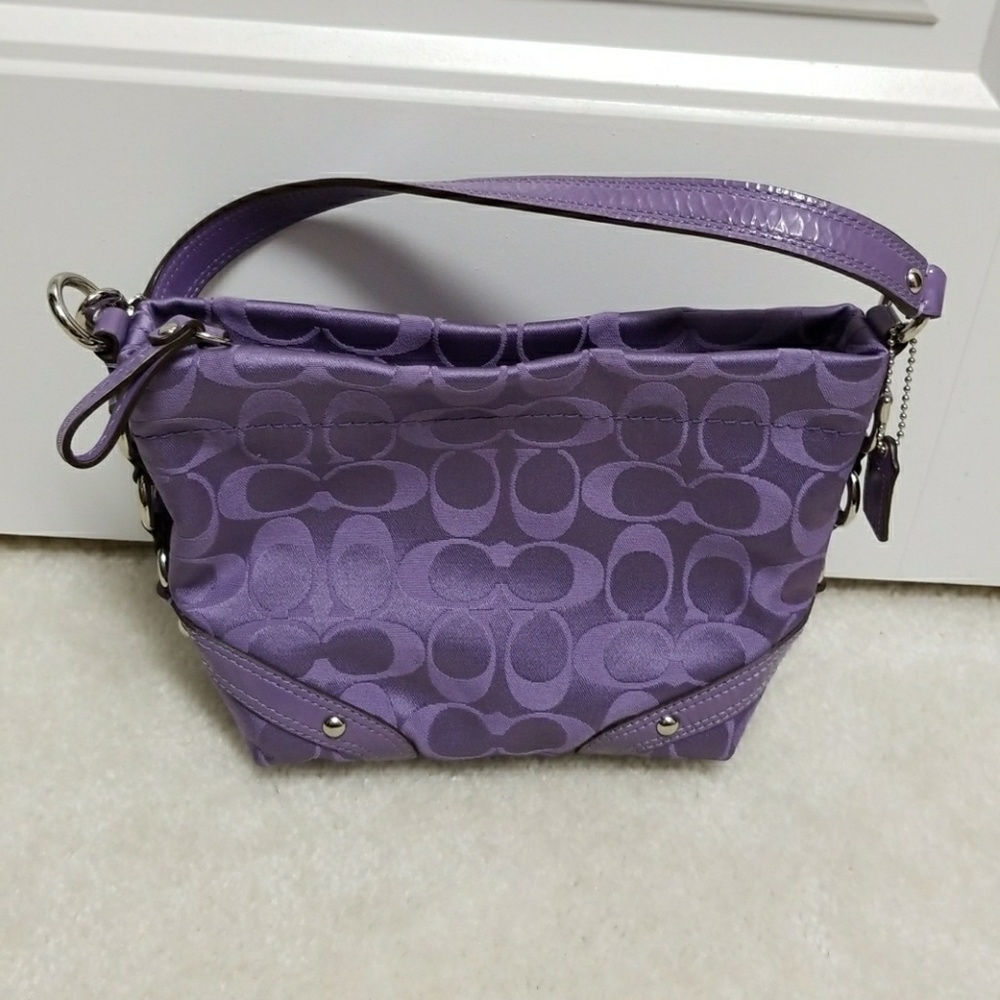 Purple coach handbag