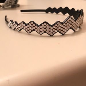 Plastic rhinestone headband with teeth .