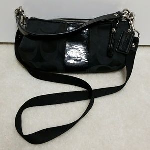 Black seguin coach purse