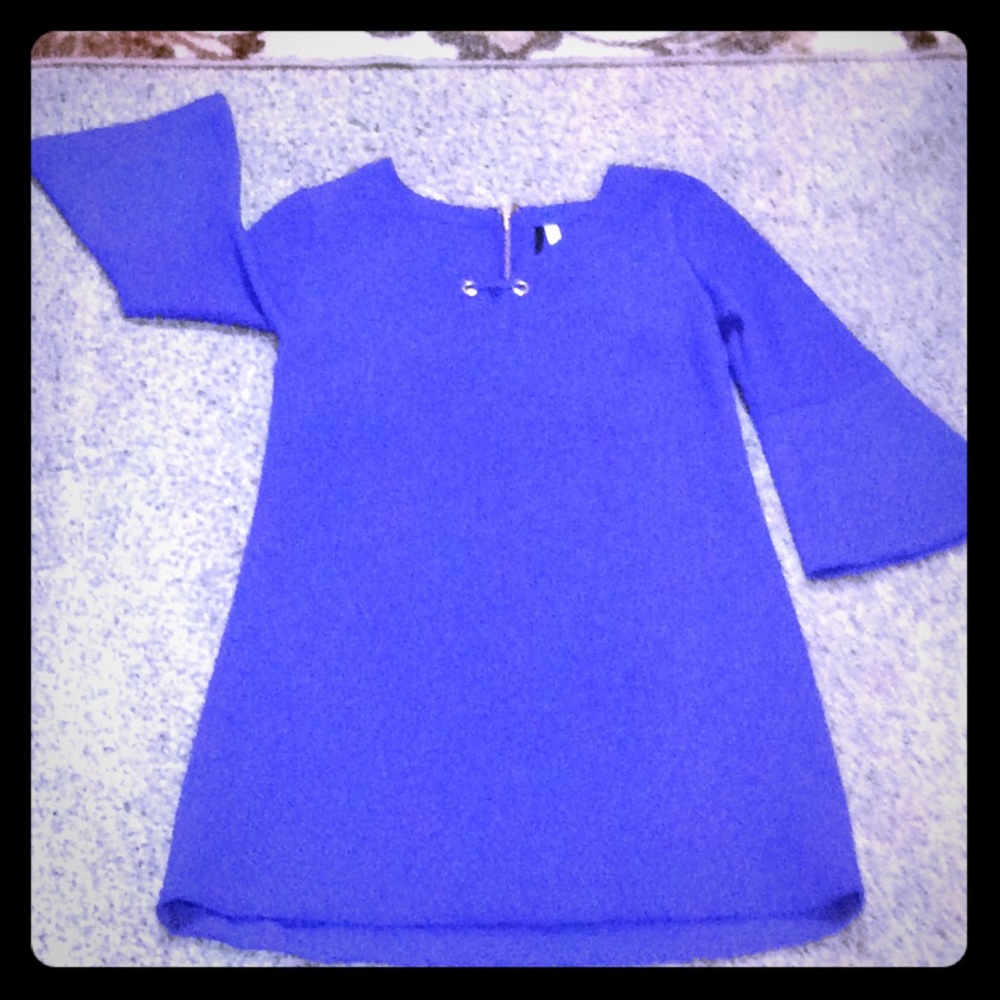 Dress with unique textured poly/spandex fabric.