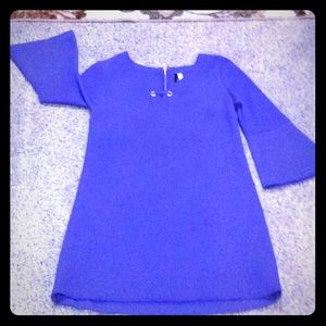 Dress with unique textured poly/spandex fabric.