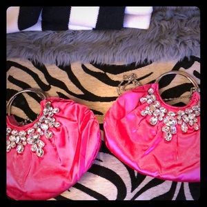2 neon pink embellished clutches