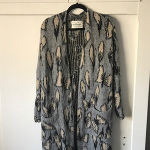 Anthropologie long "bow" sweater