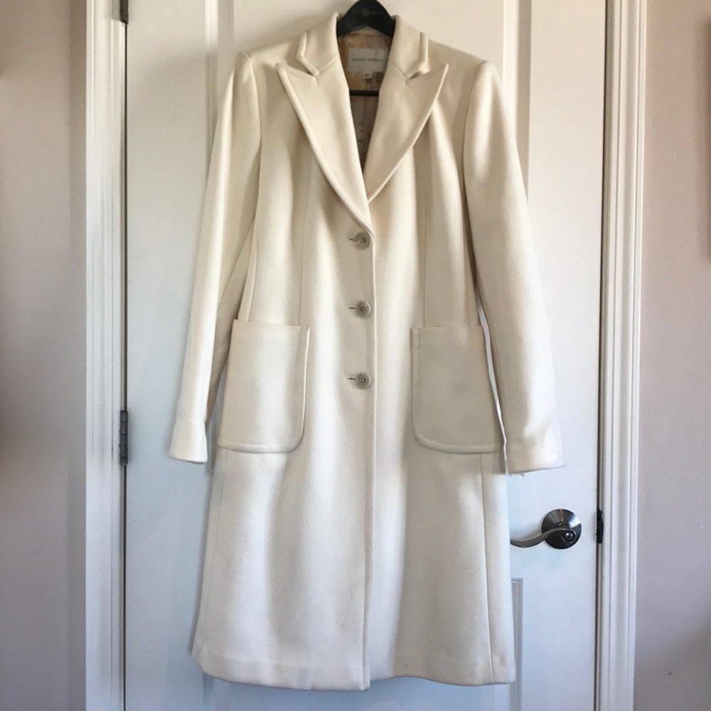 Wool-blend button up long coat.