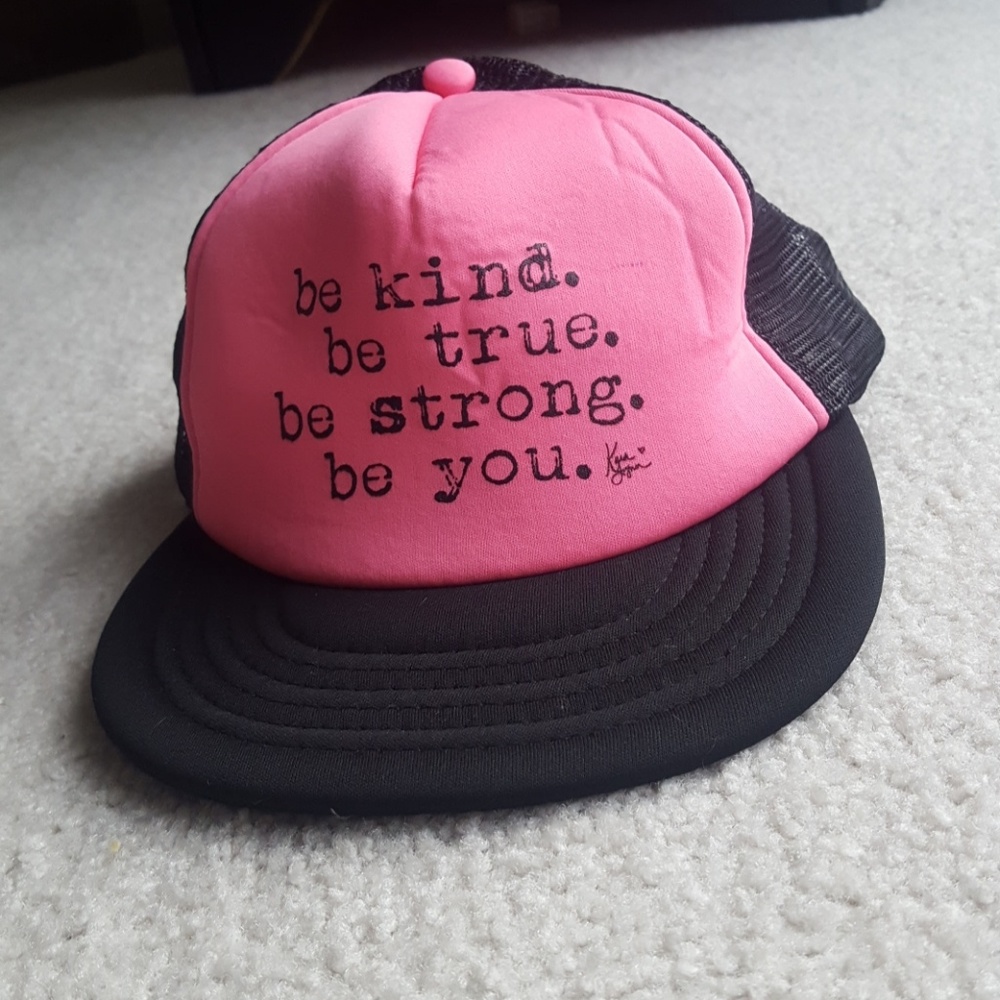 Pink  hat with black mesh and adjustable strap