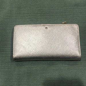 Kate Spade Silver Wallet in Used condition