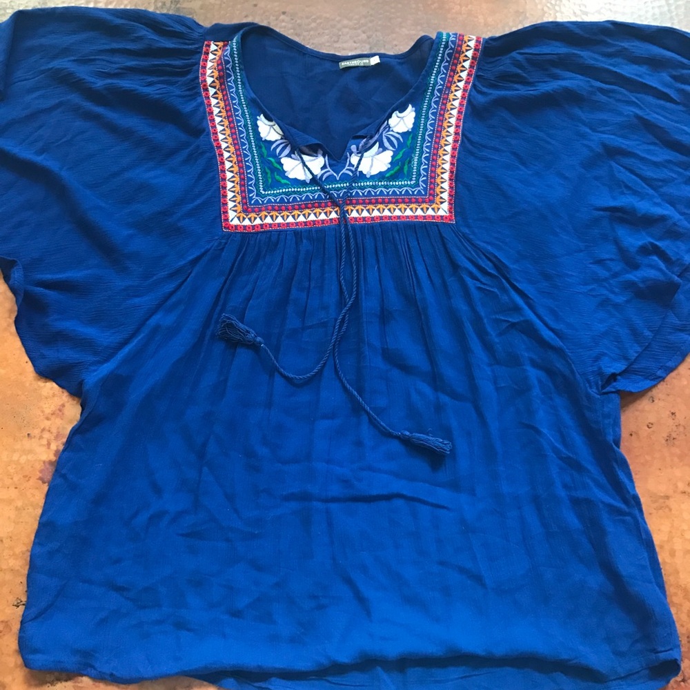 Boho style blouse. Embroidered front.