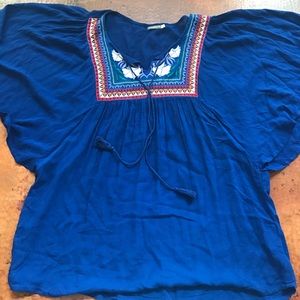 Boho style blouse. Embroidered front.
