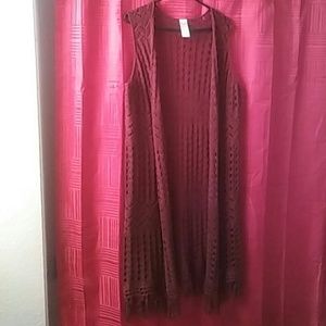 Knitted sleeveless long sweater