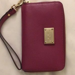 Micheal Kors magenta wristlet