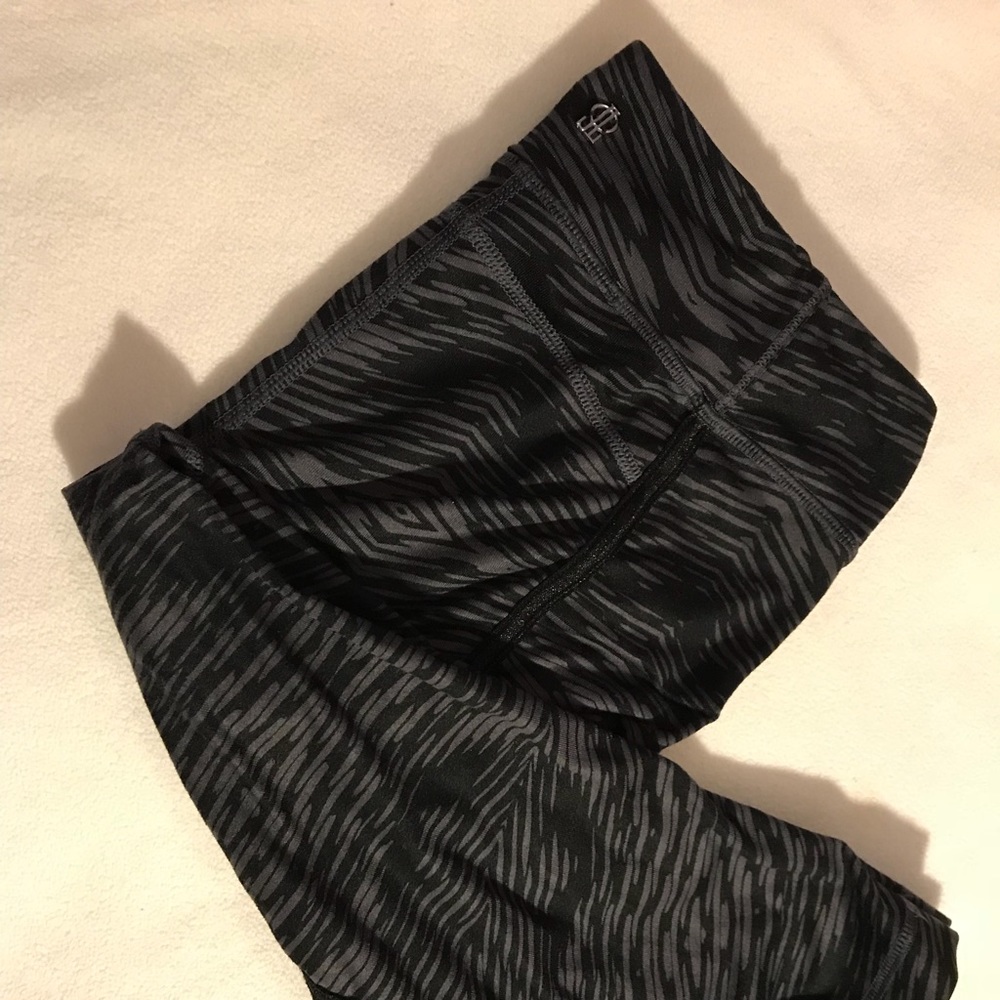 Jennifer Lopez short Capri workout pants.
