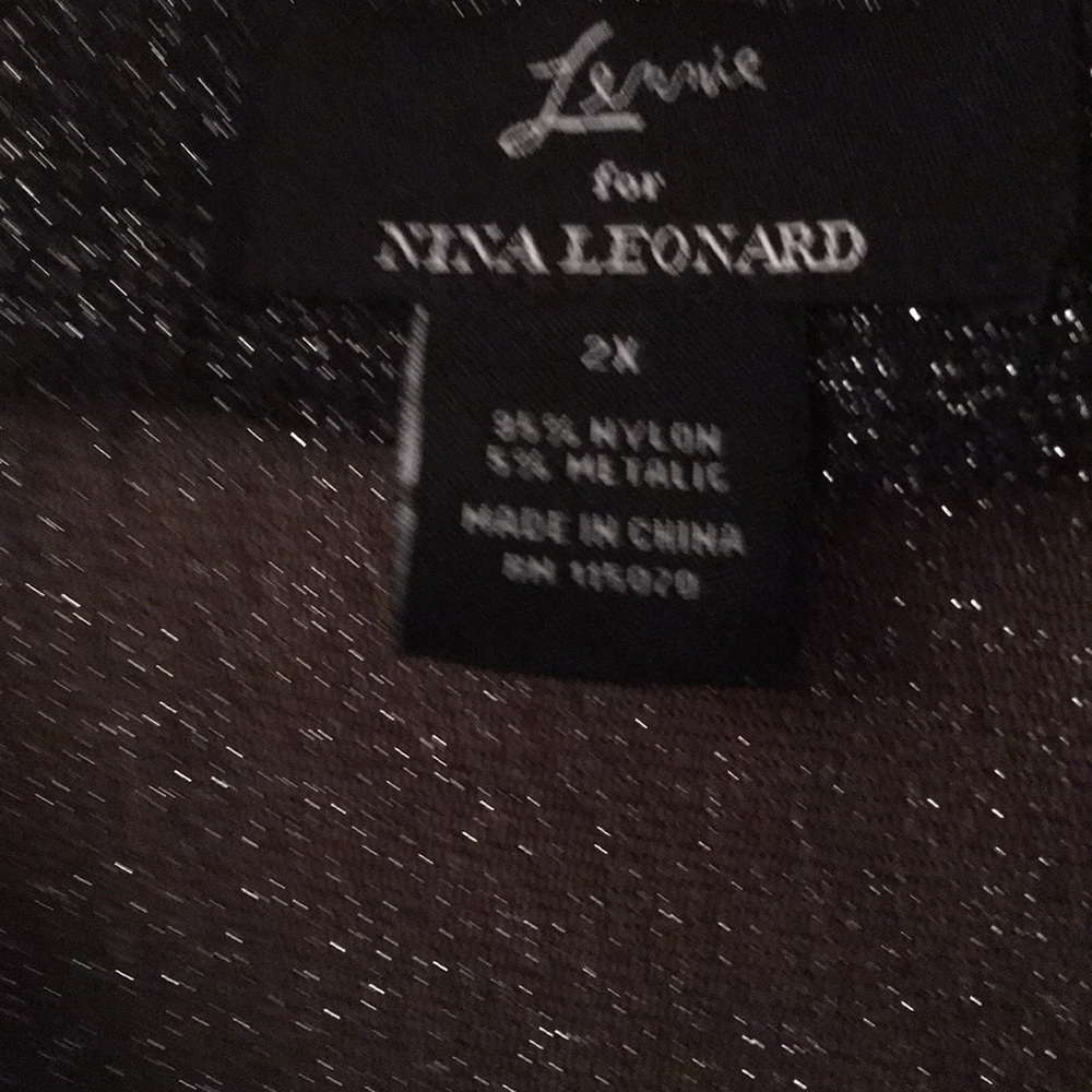 Classy black silver bolero 2x. It runs small