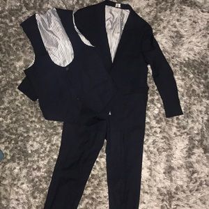 Fancy 3 piece suit: blazer, pants and vest.