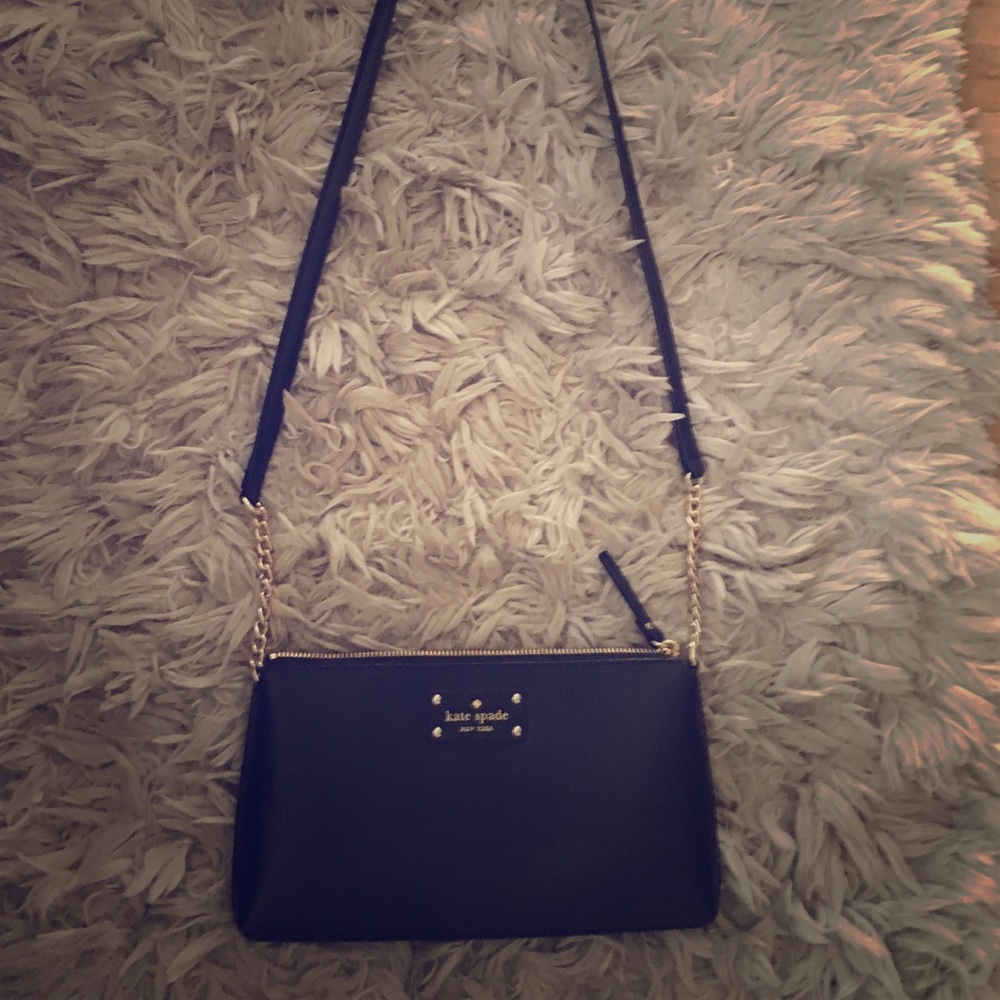 Kate Spade black and gold crossbody bag. Like new.