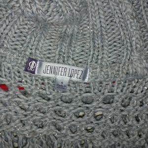 Swoop neck, moc sleeveless sweater