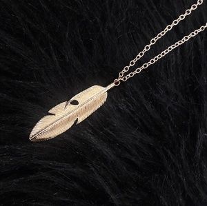 Gold feather necklace