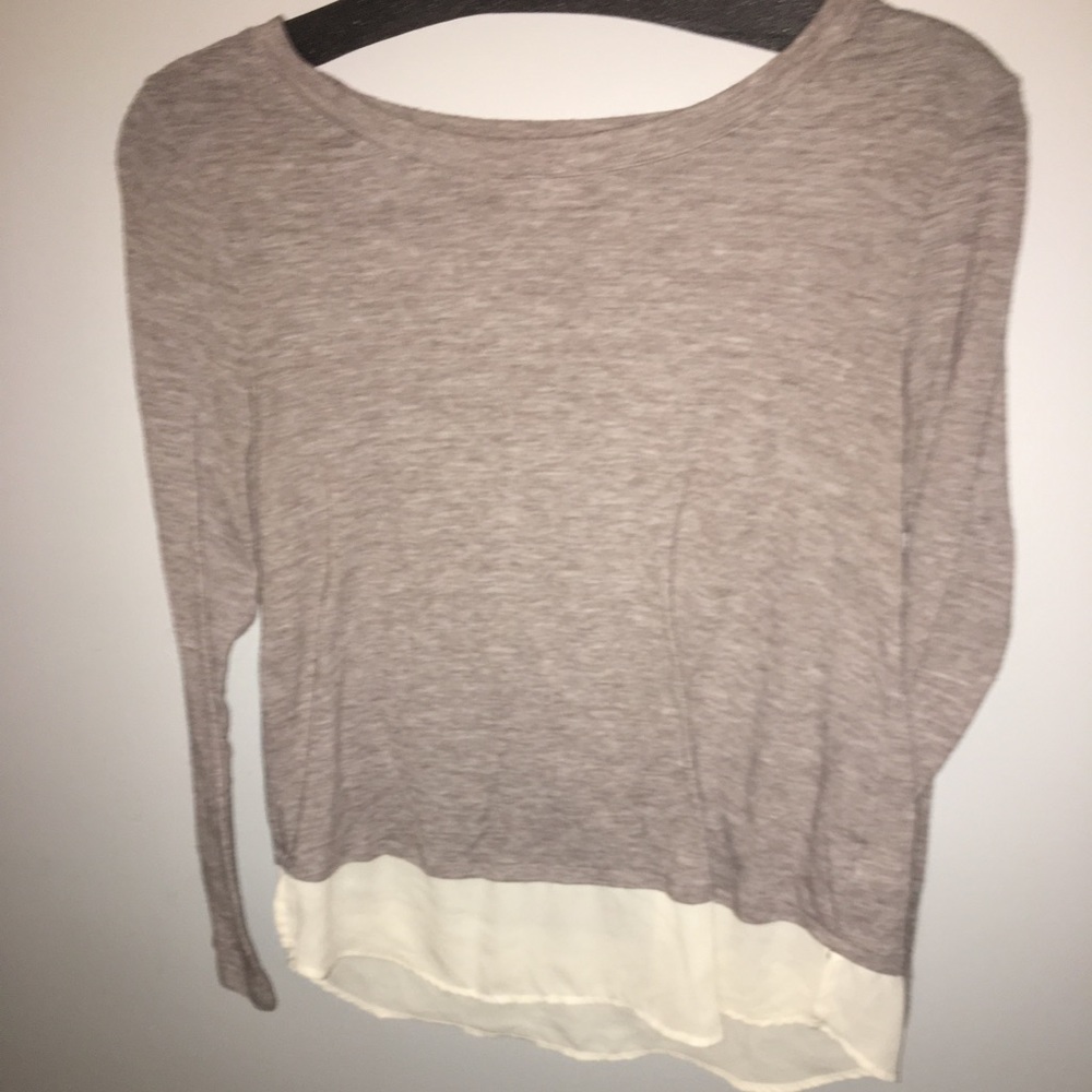 Tan long sleeve shirt with white bottom