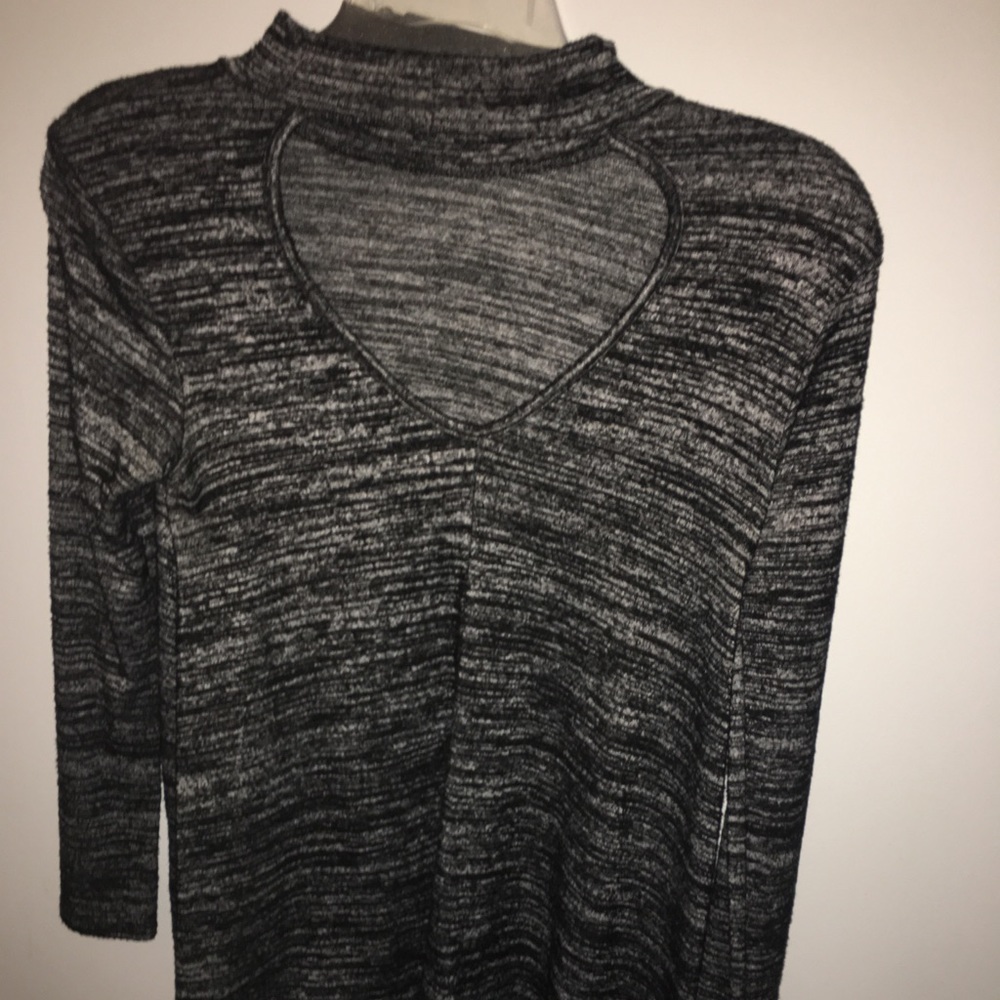 Black long sleeve shirt with cut out
