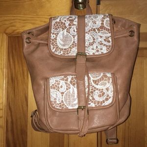 Brown backpack with flowered design!