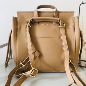 Shop Simple Essentials Bags - Contemporary Vegan Leather Backpack- Beige Shop Simple Essentials Bags - Contemporary Vegan Leather Backpack- Beige