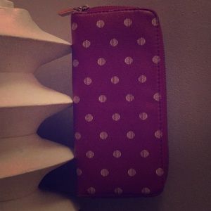 Purple polka dot wallet.
