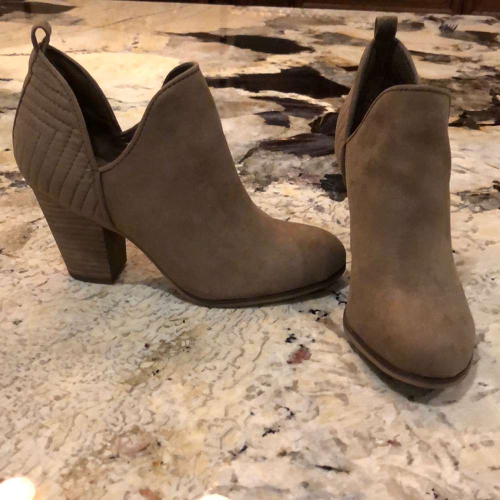 Carlos Santana ankle boots.