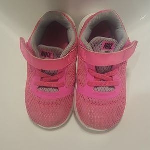 Hot pink girls Nike sneakers