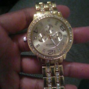 Gold Geneva watch