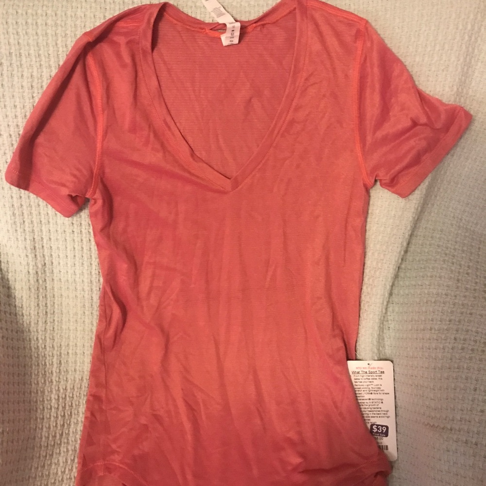Size 4 pink LuLulemon shirt.