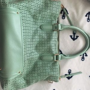 Mint green gently used Urban Expressions bag
