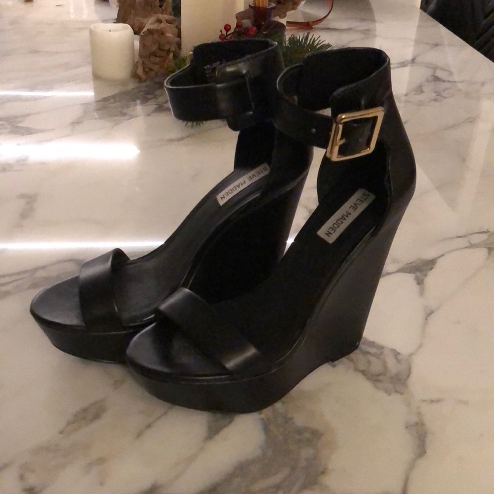 Never been worn, black wedges w/ gold buckle