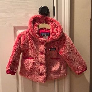 Pink Patagonia Baby winter jacket.