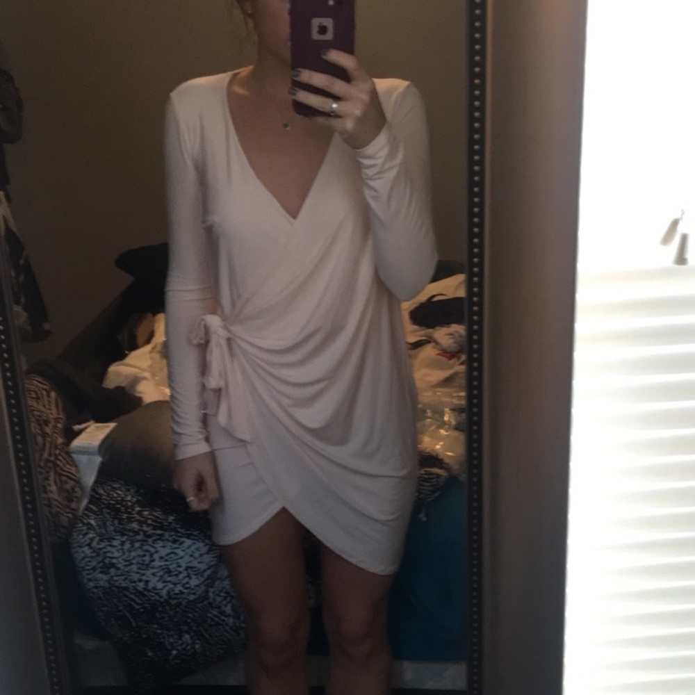 Light pink wrap dress by BooHoo. Never worn.