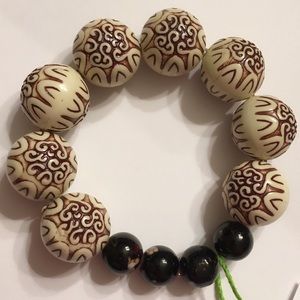 Handmade fat cream and brown beaded bracelet