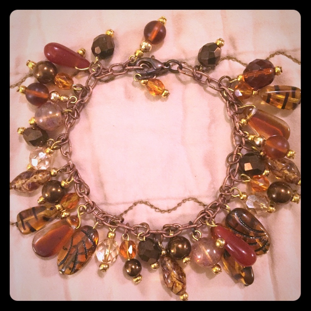 Amber and tortoise bead charm bracelet