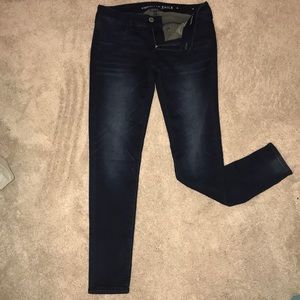 Dark washed American eagle jeans.