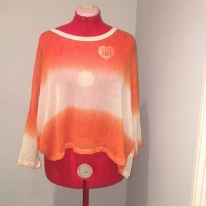 Orange and white sweater