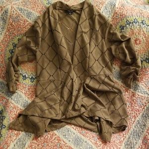 Tan cardigan with cut out pattern