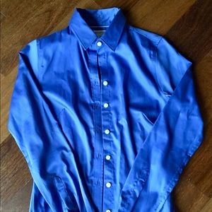 Bright blue button up shirt