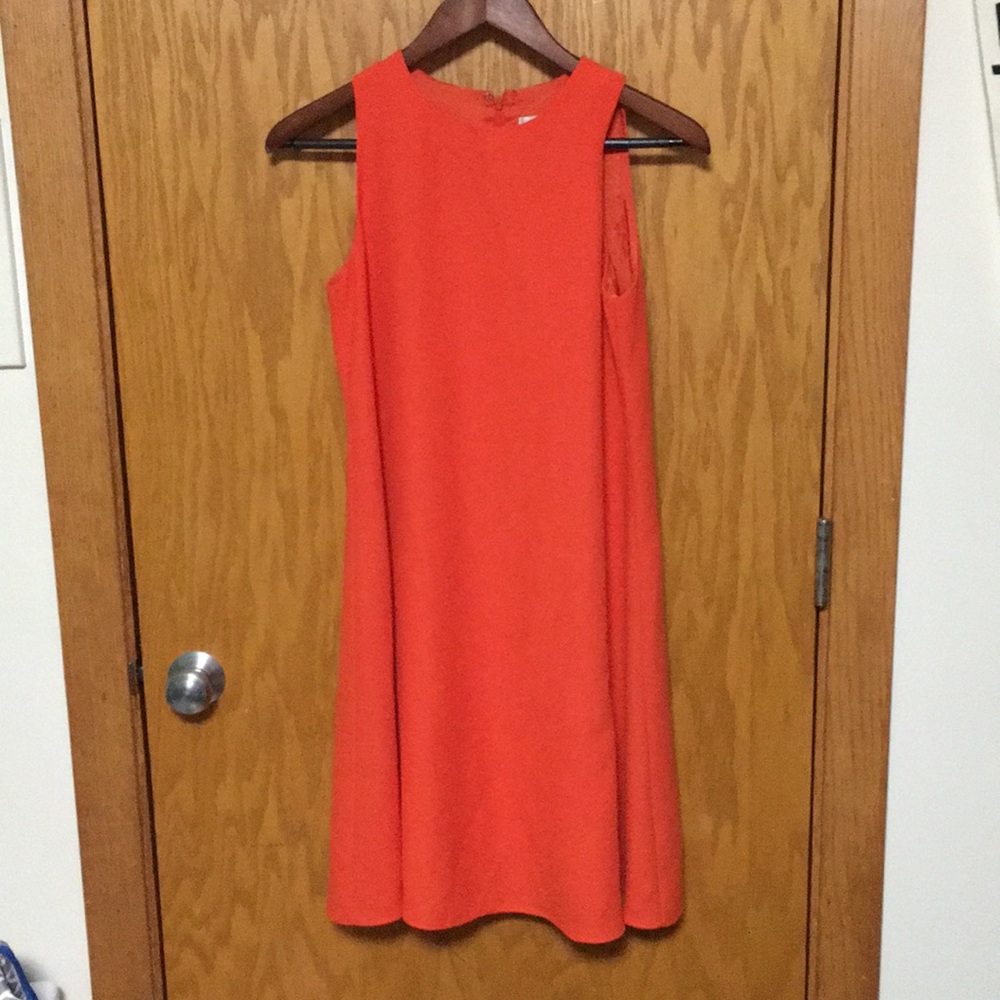 Orange sleeveless swing dress