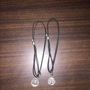 Two Alex and Ani pull cord bracelets