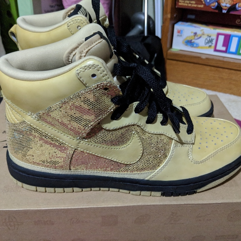 Nike high top dunks: metallic gold, gold, and blac