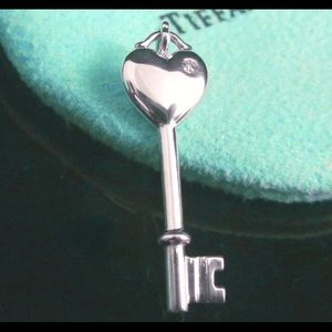 Tiffany & Co small key charm with diamond.