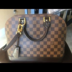 Louis Vuitton bag with Louis Vuitton stripe