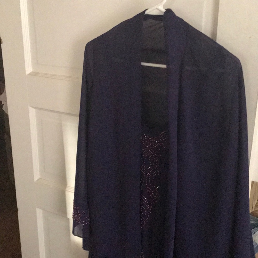 Beautiful sleeveless evening dress with jacket
