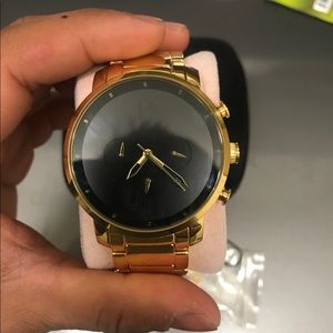 Mvmt Gold with black face watch