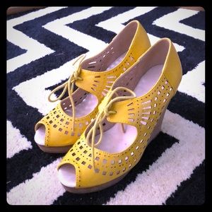 Yellow wedge shoes