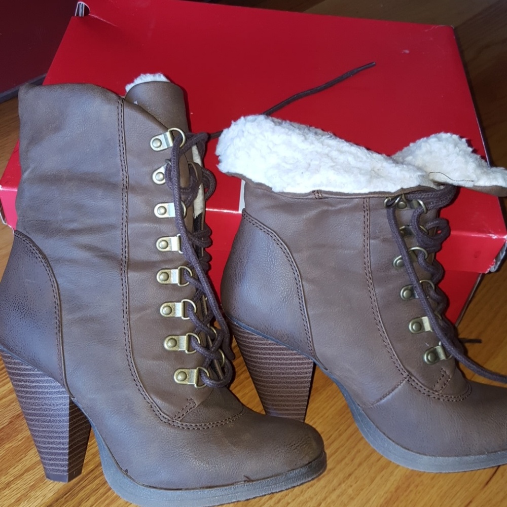 Like new in Box brown lace up boots with heel