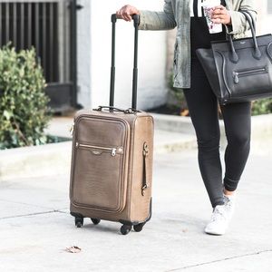 Carry on size rolling suitcase