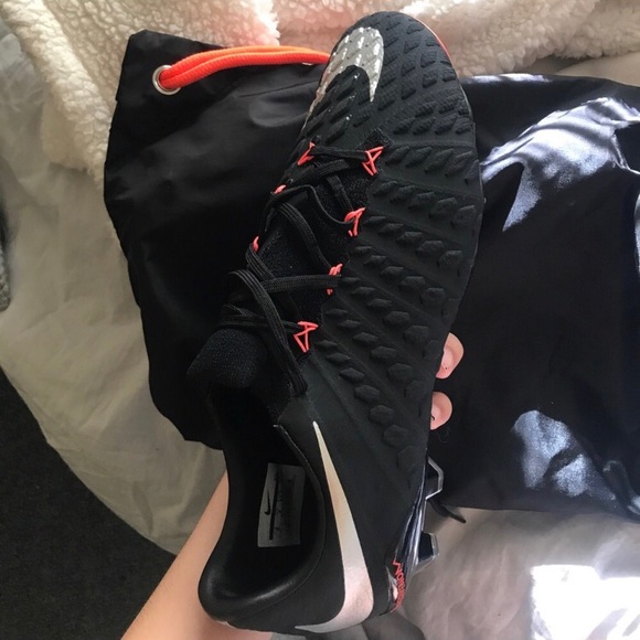 Black & orange Nike cleats... never worn..